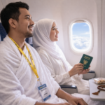 jamaah haji plus semarang duduk di dalam pesawat menuju tanah suci dengan suasana tenang dan bahagia